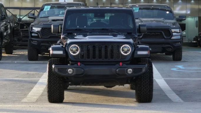 New Jeep Wrangler IV (JL) Facelift, 2.0 l, 2024 in Dubai by Auto Max Group, Black color. GCC Specs | AUTO.AE