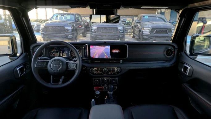 New Jeep Wrangler IV (JL) Facelift, 2.0 l, 2024 in Dubai by Auto Max Group, Black color. GCC Specs | AUTO.AE