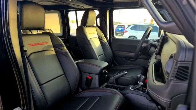 New Jeep Wrangler IV (JL) Facelift, 2.0 l, 2024 in Dubai by Auto Max Group, Black color. GCC Specs | AUTO.AE