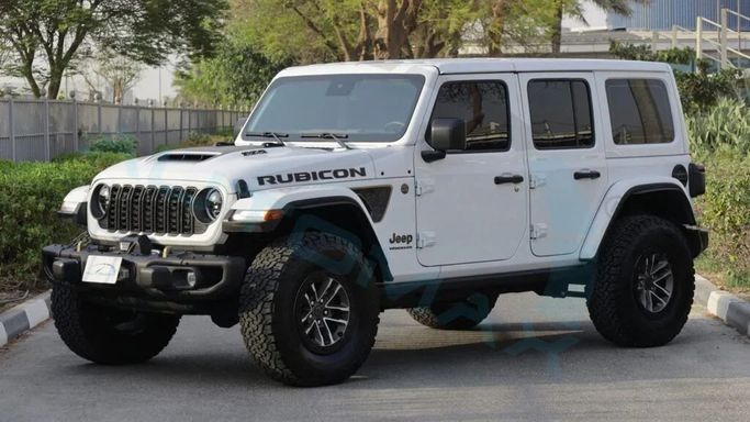 New Jeep Wrangler IV (JL) Facelift, 6.4 l, 2024 in Dubai by Auto Max Group, White color. GCC Specs | AUTO.AE