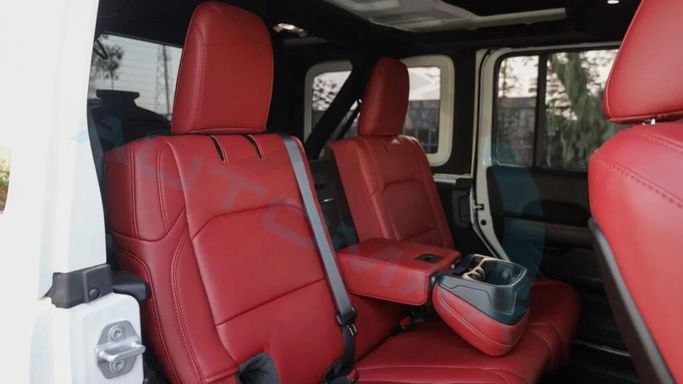 New Jeep Wrangler IV (JL) Facelift, 6.4 l, 2024 in Dubai by Auto Max Group, White color. GCC Specs | AUTO.AE