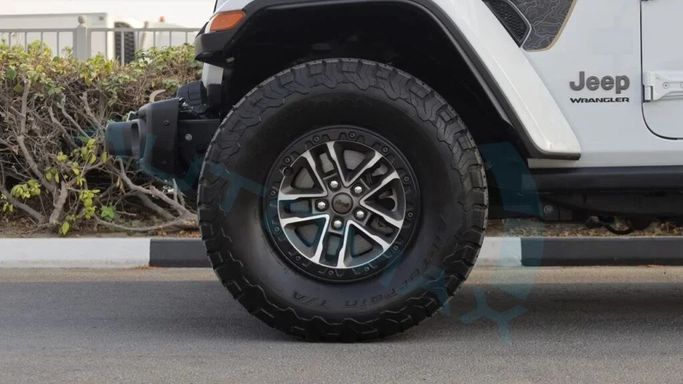 New Jeep Wrangler IV (JL) Facelift, 6.4 l, 2024 in Dubai by Auto Max Group, White color. GCC Specs | AUTO.AE