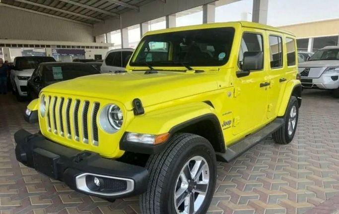 Новый Jeep Wrangler IV (JL), 3.6 л, 2023 в Дубае от Mohamed Hakim Motors Желтый цвет. GCC | AUTO.AE