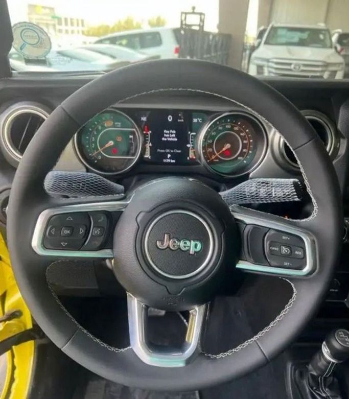Новый Jeep Wrangler IV (JL), 3.6 л, 2023 в Дубае от Mohamed Hakim Motors Желтый цвет. GCC | AUTO.AE