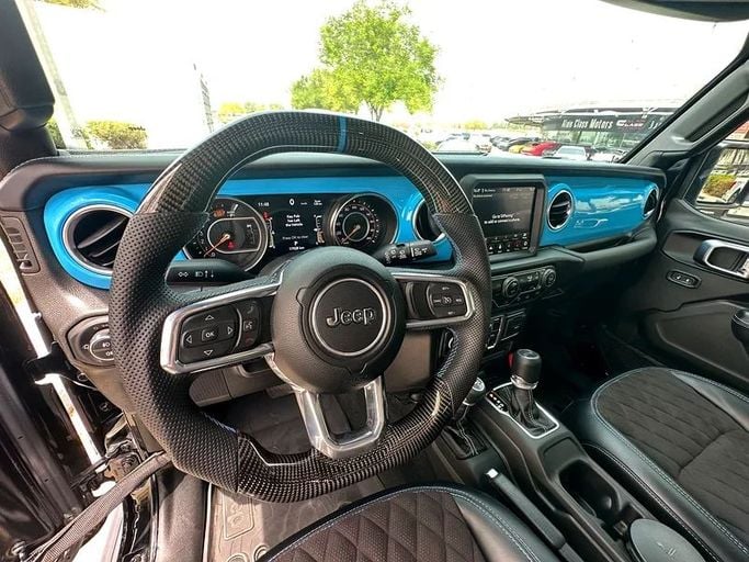 Used Jeep Wrangler IV (JL), 2.0 l, 2023 in Dubai by Formula Motors, Black color. GCC Specs | AUTO.AE