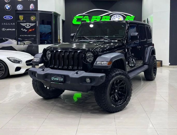 Подержанный Jeep Wrangler IV (JL), 3.6 л, 2021 в Дубае от Carbon Cars Черный цвет. GCC | AUTO.AE
