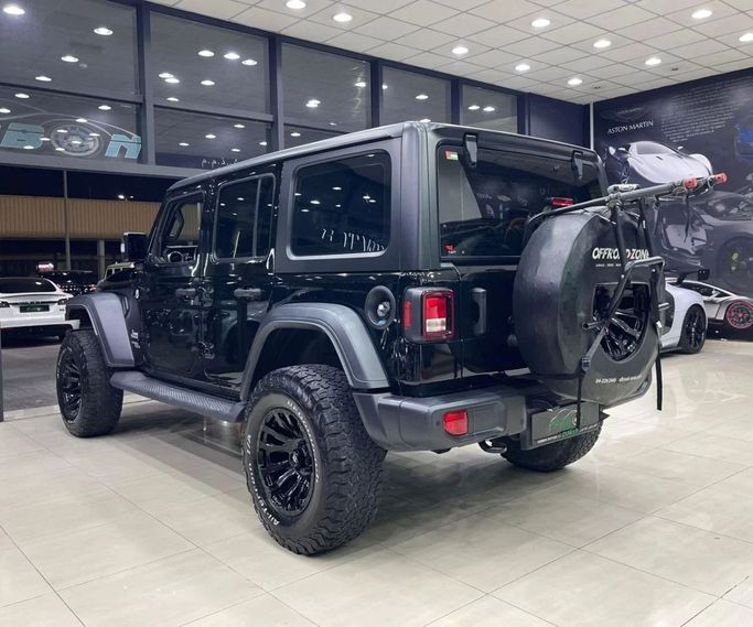 Подержанный Jeep Wrangler IV (JL), 3.6 л, 2021 в Дубае от Carbon Cars Черный цвет. GCC | AUTO.AE