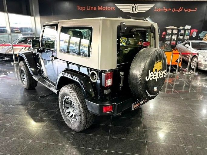 Подержанный Jeep Wrangler III (JK), 3.6 л, 2009 в Дубае от Top Line Motors Черный цвет. GCC | AUTO.AE