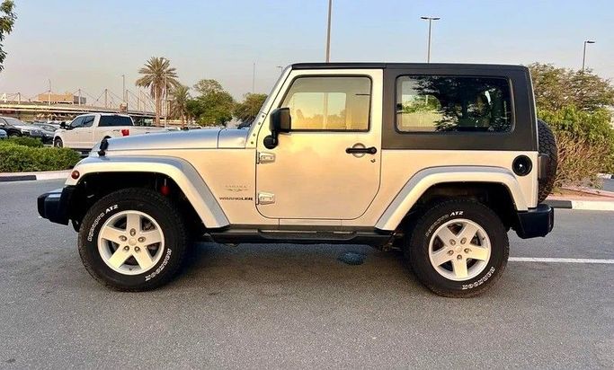 Подержанный Jeep Wrangler III (JK), 3.8 л, 2009 в Дубае от Designo Cars Trading Серебристый цвет. GCC | AUTO.AE