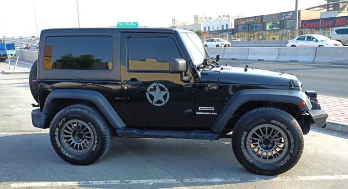 Подержанный Jeep Wrangler III (JK), 3.6 л, 2012 в Дубае Черный цвет. GCC | AUTO.AE