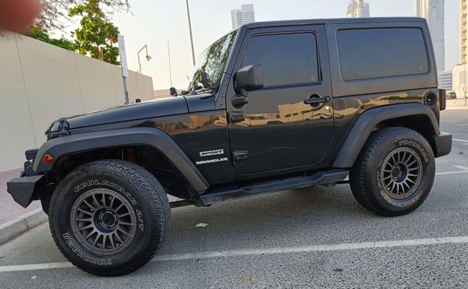 Подержанный Jeep Wrangler III (JK), 3.6 л, 2012 в Дубае Черный цвет. GCC | AUTO.AE