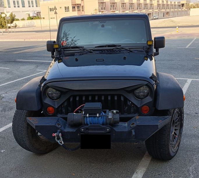 Подержанный Jeep Wrangler III (JK), 3.6 л, 2012 в Дубае Черный цвет. GCC | AUTO.AE