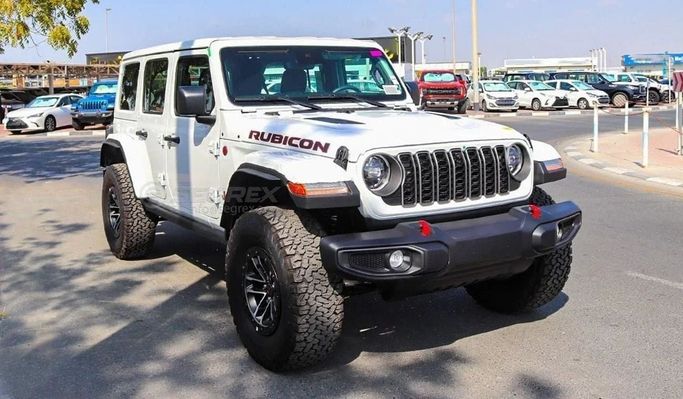 New Jeep Wrangler IV (JL) Facelift, 2.0 l, 2024 in Dubai by Segrex Auto, White color. GCC Specs | AUTO.AE