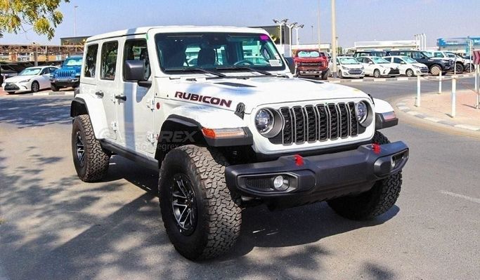 Used Jeep Wrangler IV (JL) Facelift, 2.0 l, 2024 in Dubai by Segrex Auto, White color. GCC Specs | AUTO.AE