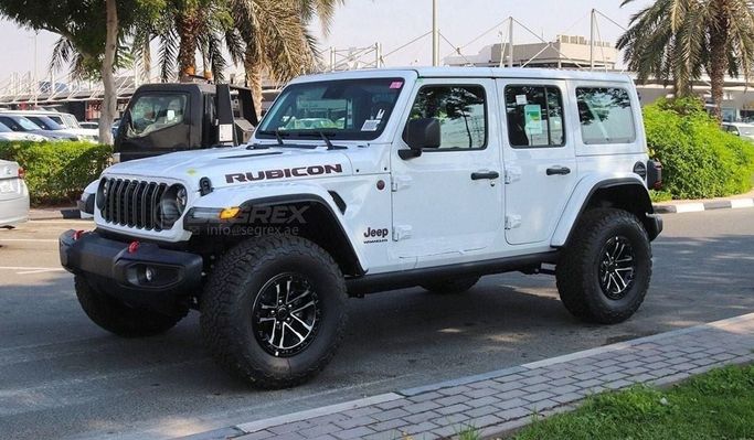 New Jeep Wrangler IV (JL) Facelift, 2.0 l, 2024 in Dubai by Segrex Auto, White color. GCC Specs | AUTO.AE