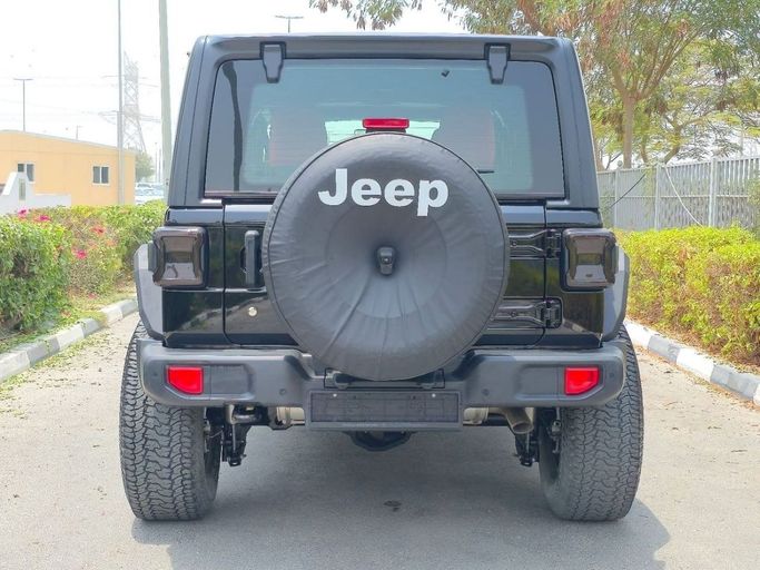 Used Jeep Wrangler IV (JL), 3.6 l, 2020 in Dubai by US Motors, Black color. GCC Specs | AUTO.AE