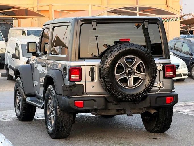 Подержанный Jeep Wrangler III (JK), 3.6 л, 2018 в Дубае от Al Qemah Used Cars Серый цвет. GCC | AUTO.AE