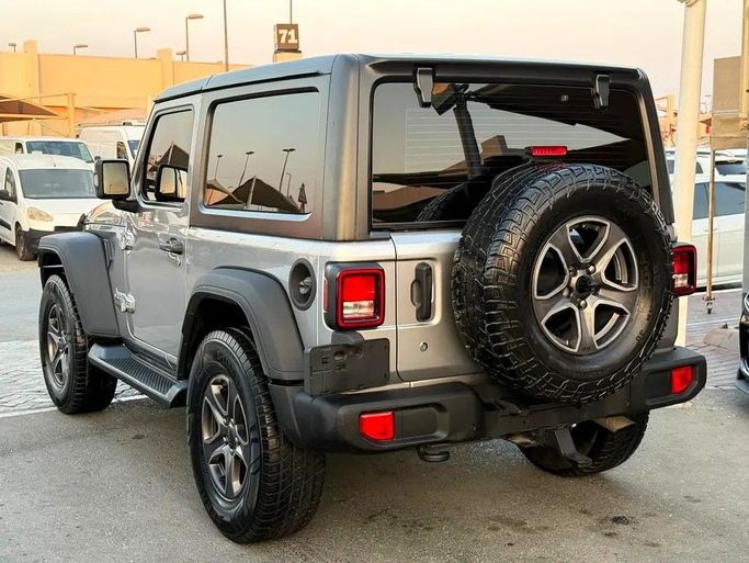 Подержанный Jeep Wrangler III (JK), 3.6 л, 2018 в Дубае от Al Qemah Used Cars Серый цвет. GCC | AUTO.AE