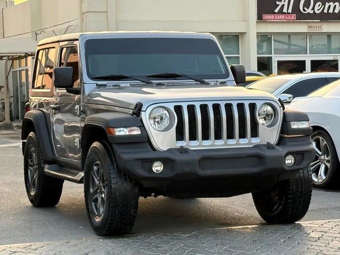 Подержанный Jeep Wrangler III (JK), 3.6 л, 2018 в Дубае от Al Qemah Used Cars Серый цвет. GCC | AUTO.AE