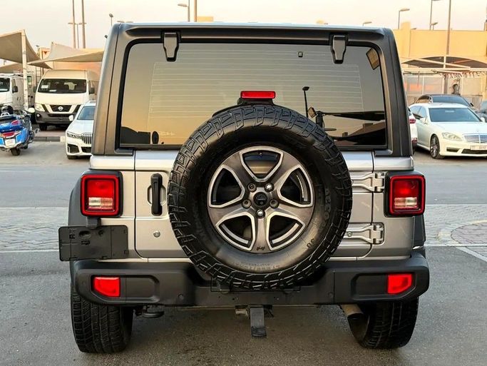 Подержанный Jeep Wrangler III (JK), 3.6 л, 2018 в Дубае от Al Qemah Used Cars Серый цвет. GCC | AUTO.AE