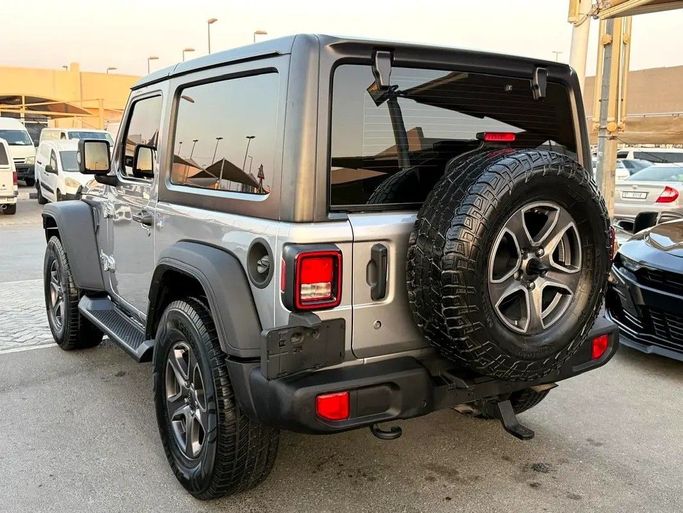 Подержанный Jeep Wrangler III (JK), 3.6 л, 2018 в Дубае от Al Qemah Used Cars Серый цвет. GCC | AUTO.AE