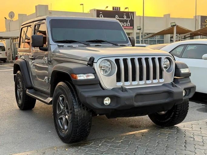 Подержанный Jeep Wrangler III (JK), 3.6 л, 2018 в Дубае от Al Qemah Used Cars Серый цвет. GCC | AUTO.AE