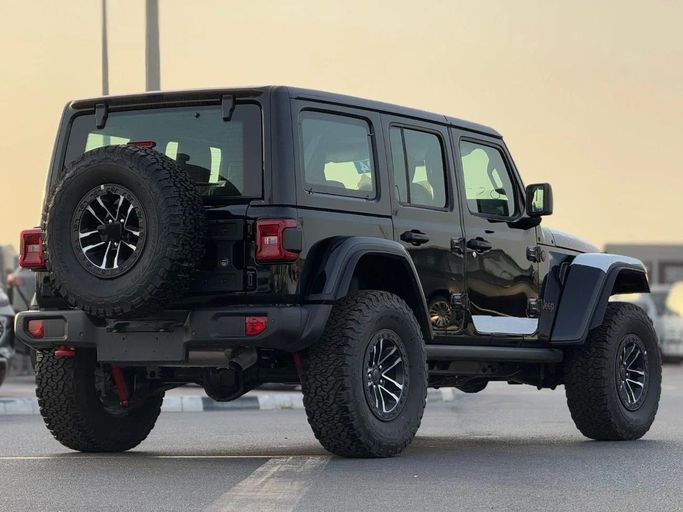 Новый Jeep Wrangler IV (JL) Рестайлинг, 2.0 л, 2025 в Дубае от Al Rawnaq Motors  Черный цвет. GCC | AUTO.AE