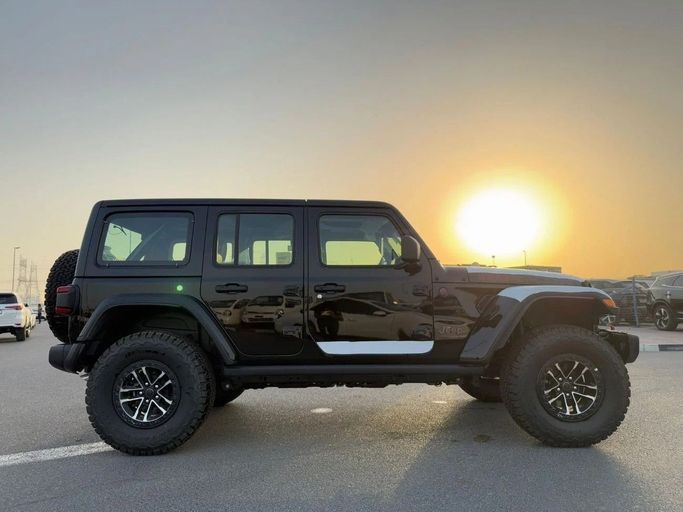 Новый Jeep Wrangler IV (JL) Рестайлинг, 2.0 л, 2025 в Дубае от Al Rawnaq Motors  Черный цвет. GCC | AUTO.AE