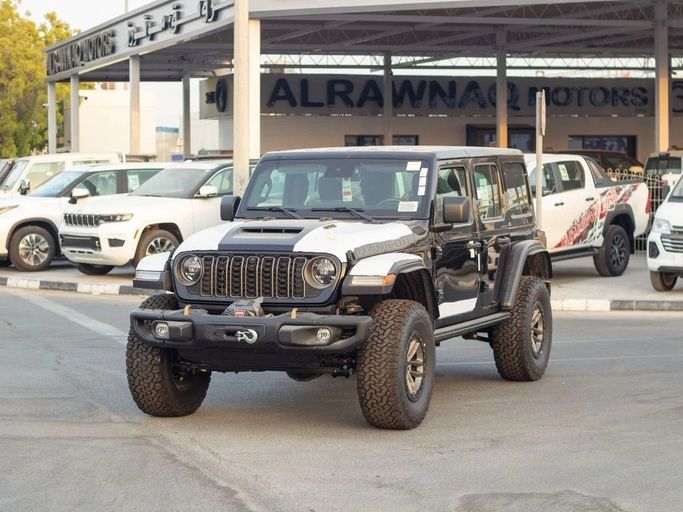 New Jeep Wrangler IV (JL) Facelift, 6.4 l, 2025 in Dubai by Al Rawnaq Motors , Black color. GCC Specs | AUTO.AE