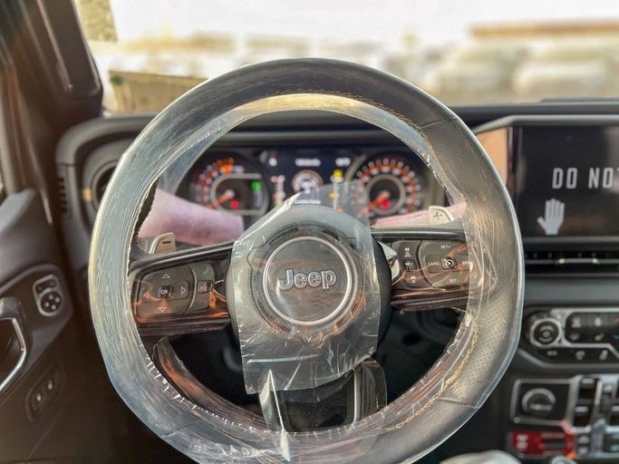 New Jeep Wrangler IV (JL) Facelift, 6.4 l, 2025 in Dubai by Al Rawnaq Motors , Black color. GCC Specs | AUTO.AE