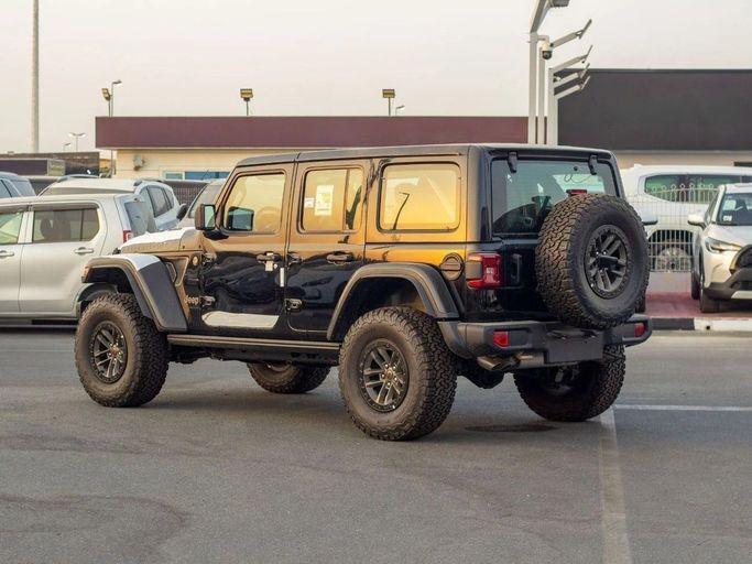 New Jeep Wrangler IV (JL) Facelift, 6.4 l, 2025 in Dubai by Al Rawnaq Motors , Black color. GCC Specs | AUTO.AE
