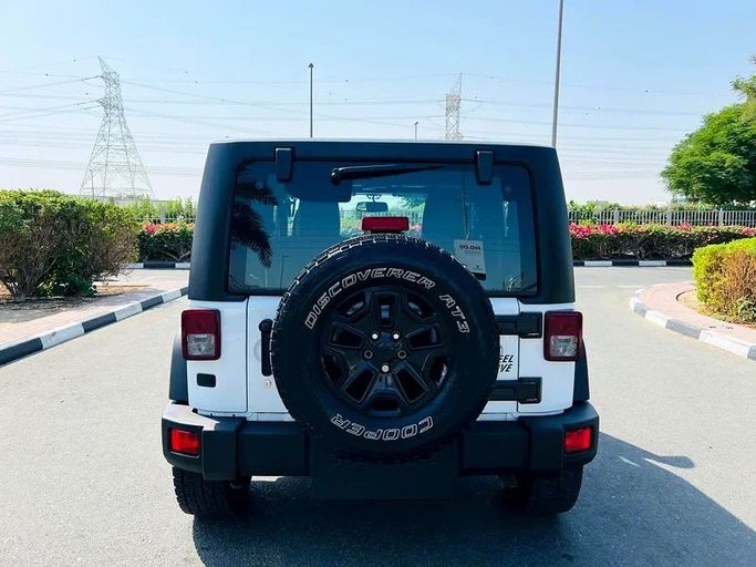 Used Jeep Wrangler IV (JL), 3.6 l, 2017 in Dubai by First Choice Motors, White color. GCC Specs | AUTO.AE