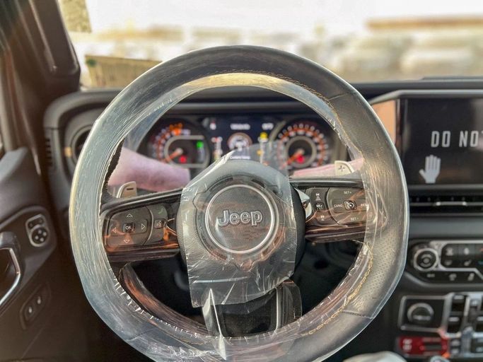 New Jeep Wrangler IV (JL) Facelift, 6.4 l, 2025 in Dubai by Al Rawnaq Motors , Blue color. GCC Specs | AUTO.AE