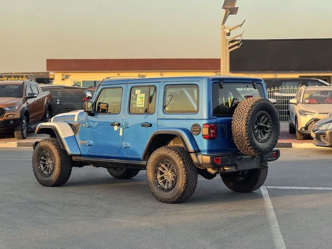 New Jeep Wrangler IV (JL) Facelift, 6.4 l, 2025 in Dubai by Al Rawnaq Motors , Blue color. GCC Specs | AUTO.AE