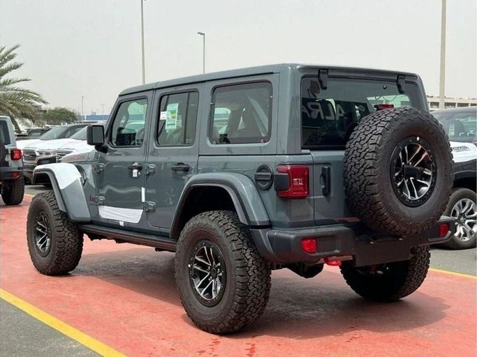 Новый Jeep Wrangler IV (JL) Рестайлинг, 3.6 л, 2024 в Дубае от Al Rawnaq Motors  Серый цвет. GCC | AUTO.AE