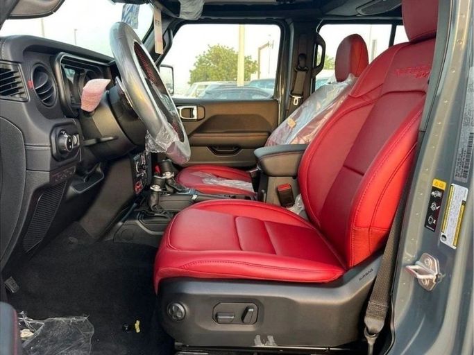 New Jeep Wrangler IV (JL) Facelift, 6.4 l, 2024 in Dubai by Al Rawnaq Motors , Grey color. GCC Specs | AUTO.AE