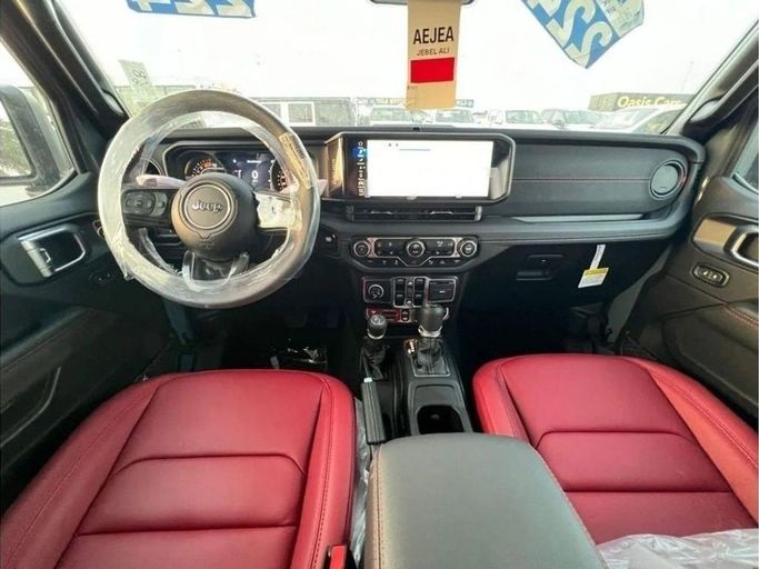 New Jeep Wrangler IV (JL) Facelift, 6.4 l, 2024 in Dubai by Al Rawnaq Motors , Grey color. GCC Specs | AUTO.AE