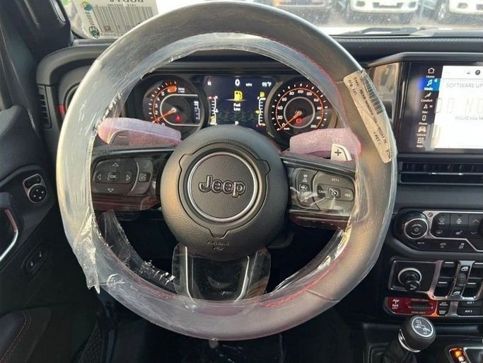 New Jeep Wrangler IV (JL) Facelift, 6.4 l, 2024 in Dubai by Al Rawnaq Motors , Grey color. GCC Specs | AUTO.AE