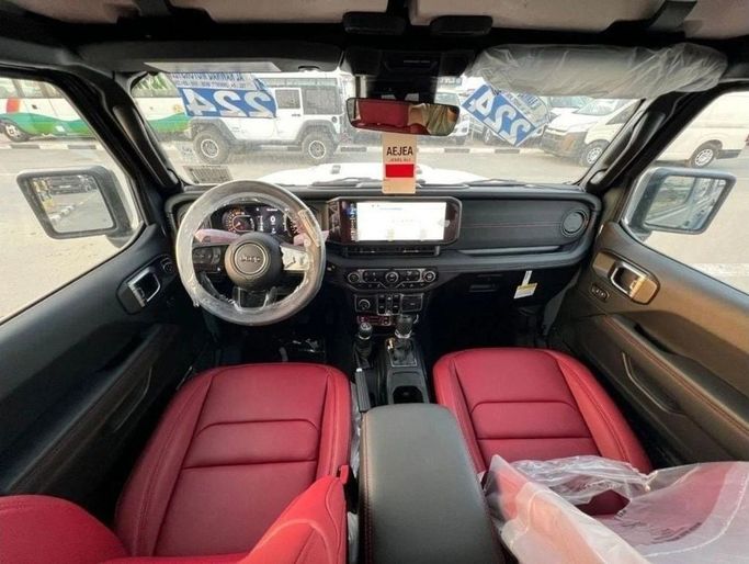 New Jeep Wrangler IV (JL) Facelift, 6.4 l, 2024 in Dubai by Al Rawnaq Motors , Grey color. GCC Specs | AUTO.AE