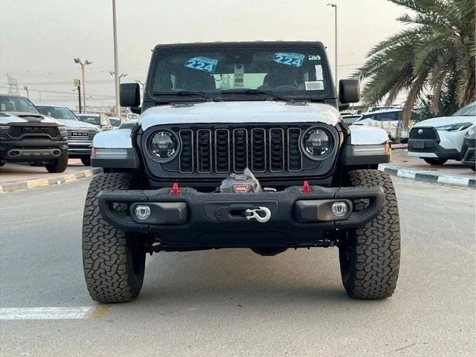 Новый Jeep Wrangler IV (JL) Рестайлинг, 3.6 л, 2024 в Дубае от Al Rawnaq Motors  Черный цвет. GCC | AUTO.AE