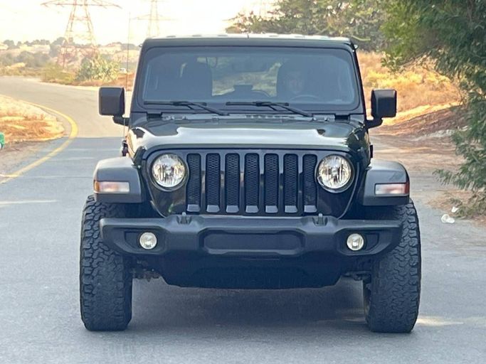 Подержанный Jeep Wrangler IV (JL), 3.6 л, 2021 в Дубае от Prestige Motos (SHJ) Черный цвет. Американская | AUTO.AE
