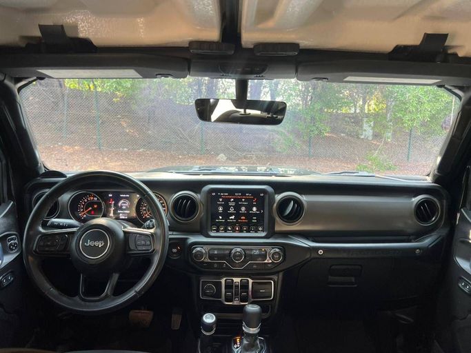 Подержанный Jeep Wrangler IV (JL), 3.6 л, 2021 в Дубае от Prestige Motos (SHJ) Черный цвет. Американская | AUTO.AE