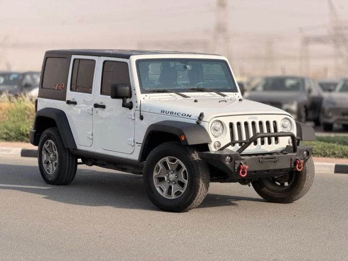 مستعملة Jeep Wrangler III (JK), 3.6 l, 2018 في في دبي من GHAZNI MOTORS، اللون أبيض. المواصفات الأمريكية | AUTO.AE