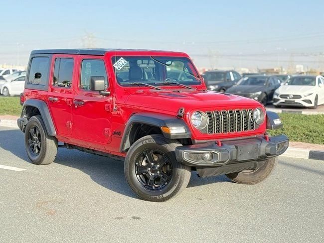 Подержанный Jeep Wrangler IV (JL), 2.0 л, 2022 в Дубае от GHAZNI MOTORS Красный цвет. Американская | AUTO.AE | Объявление #259089