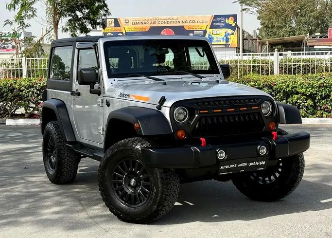 مستعملة Jeep Wrangler III (JK), 3.6 l, 2012 في في دبي من Auto Links LLC، اللون فضي. مواصفات الخليج | AUTO.AE | إعلان #260852