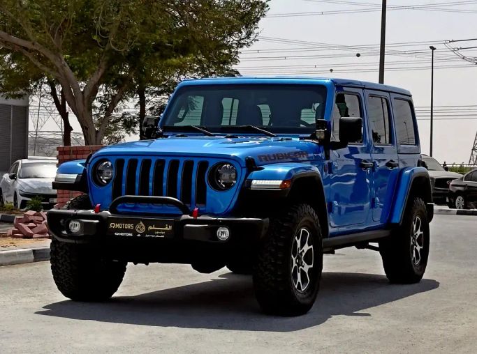 Подержанный Jeep Wrangler IV (JL), 3.6 л, 2023 в Дубае от Q Motors Голубой цвет. GCC | AUTO.AE | Объявление #263581