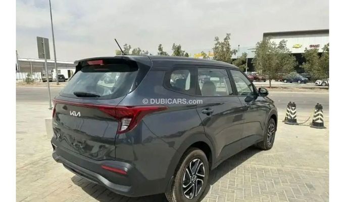 New Kia Carens IV (KY), 1.5 l, 2023 in Dubai by Mohamed Hakim Motors, Light Blue color. GCC Specs | AUTO.AE