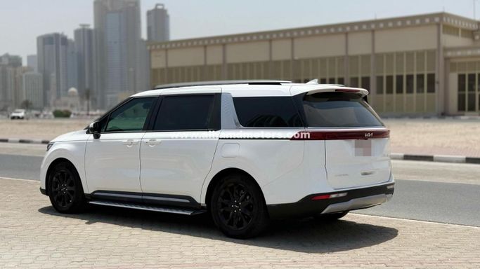 Used Kia Carnival IV, 2.2 l, 2023 in Dubai by Alhamd Motors, White color. Other | AUTO.AE