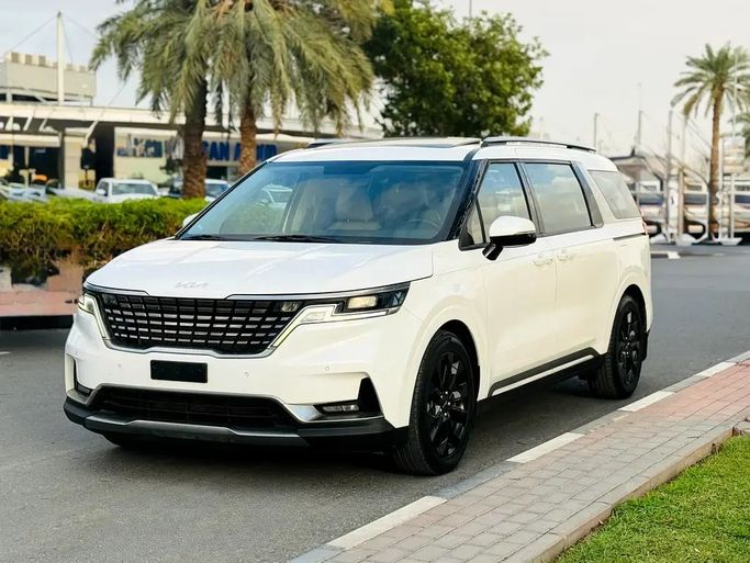 Used Kia Carnival IV, 3.5 l, 2022 in Dubai by Verified Hub Used Automobile Trading LLC, White color. GCC Specs | AUTO.AE