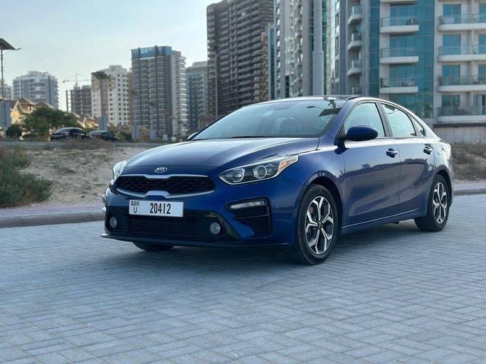 Kia Forte III Facelift, 2022  sedan for rent in Dubai by more rent a car, blue color | AUTO.AE
